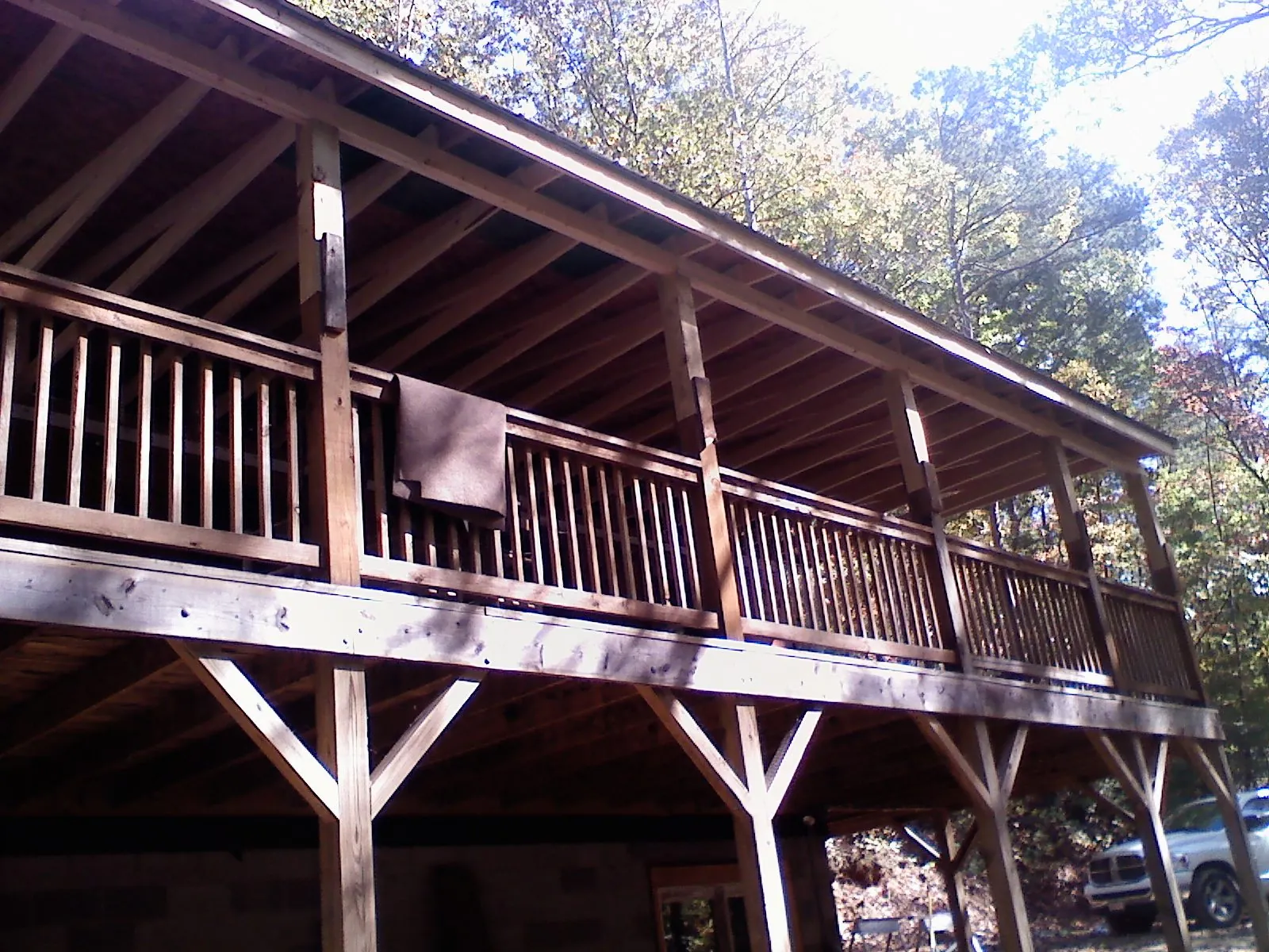 Timber framing under a new elevated porch and deck — Roof Leak Repair in Kenosha by Roofing Brothers